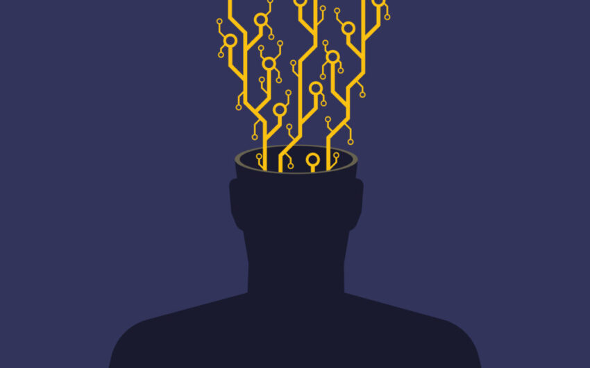 An image of a faceless human silhouette (chest up) with exposed microchip contacts and circuitry erupting from its open head. This visual metaphor explores transhumanism, AI integration, or the erosion of organic thought in the digital age. The stark contrast between the biological silhouette and mechanical components highlights themes of technological dependence or posthuman evolution. Ideal for articles on neural implants, futurism, or the ethics of human augmentation.