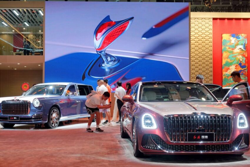 Visitors are visiting the Hongqi booth at the 21st Changchun International Automobile Expo in Changchun, Jilin province, China, on July 17, 2024.