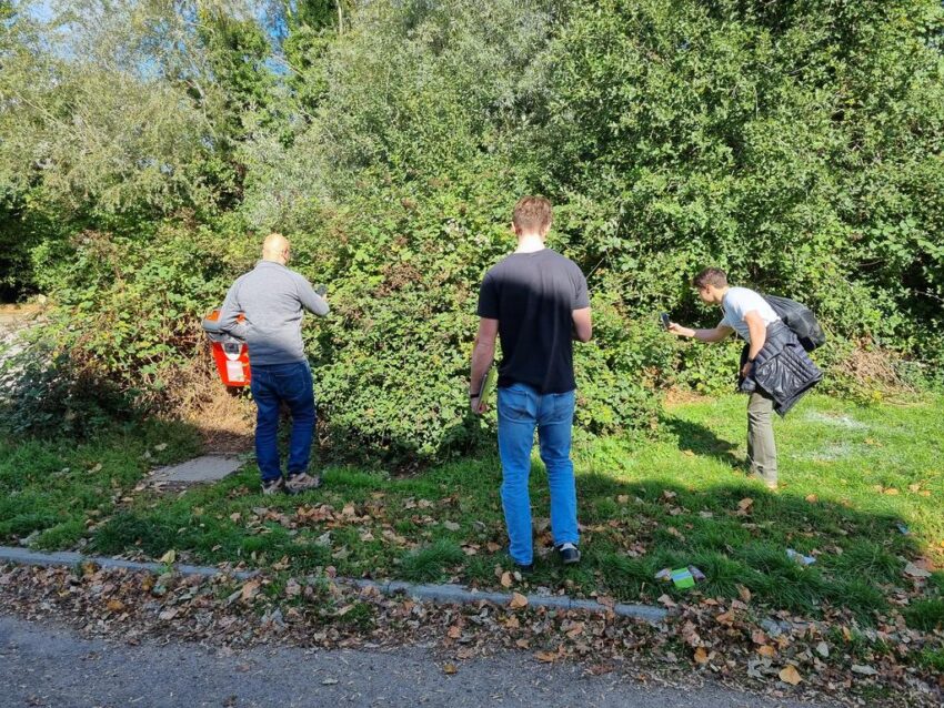 The research team locating their first bramble.